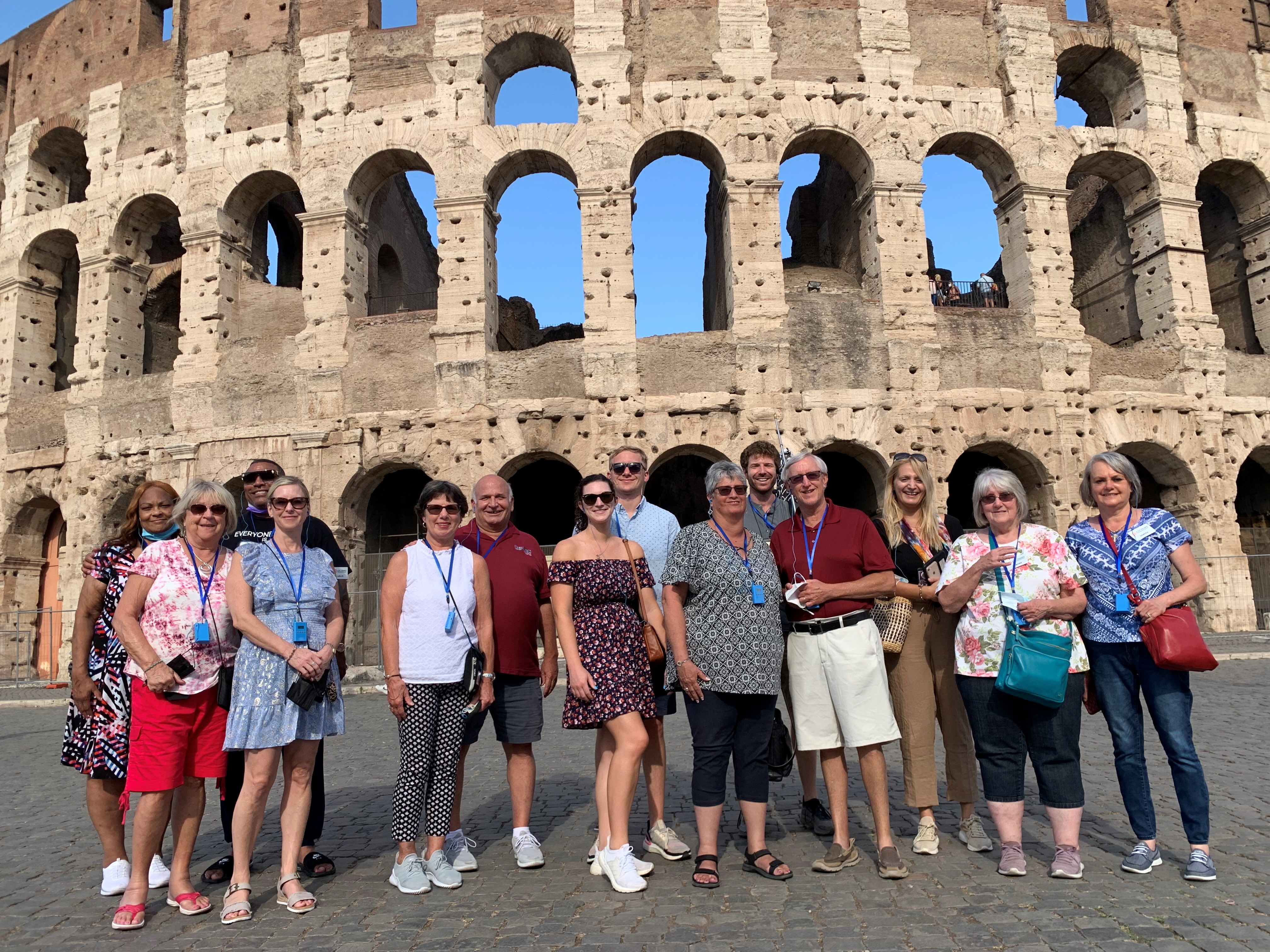 Group of travelers at Roman Colosseum